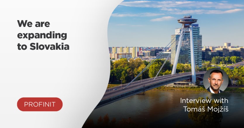 Banner announcing Profinit’s new branch in Slovakia, featuring Bratislava’s UFO Bridge and a portrait of Tomáš Mojžíš.